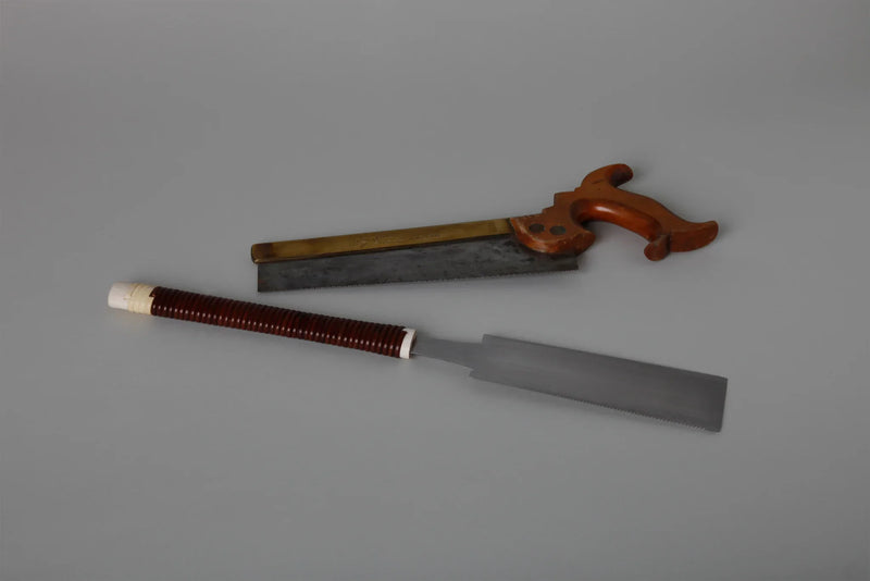 East and West: The Saw